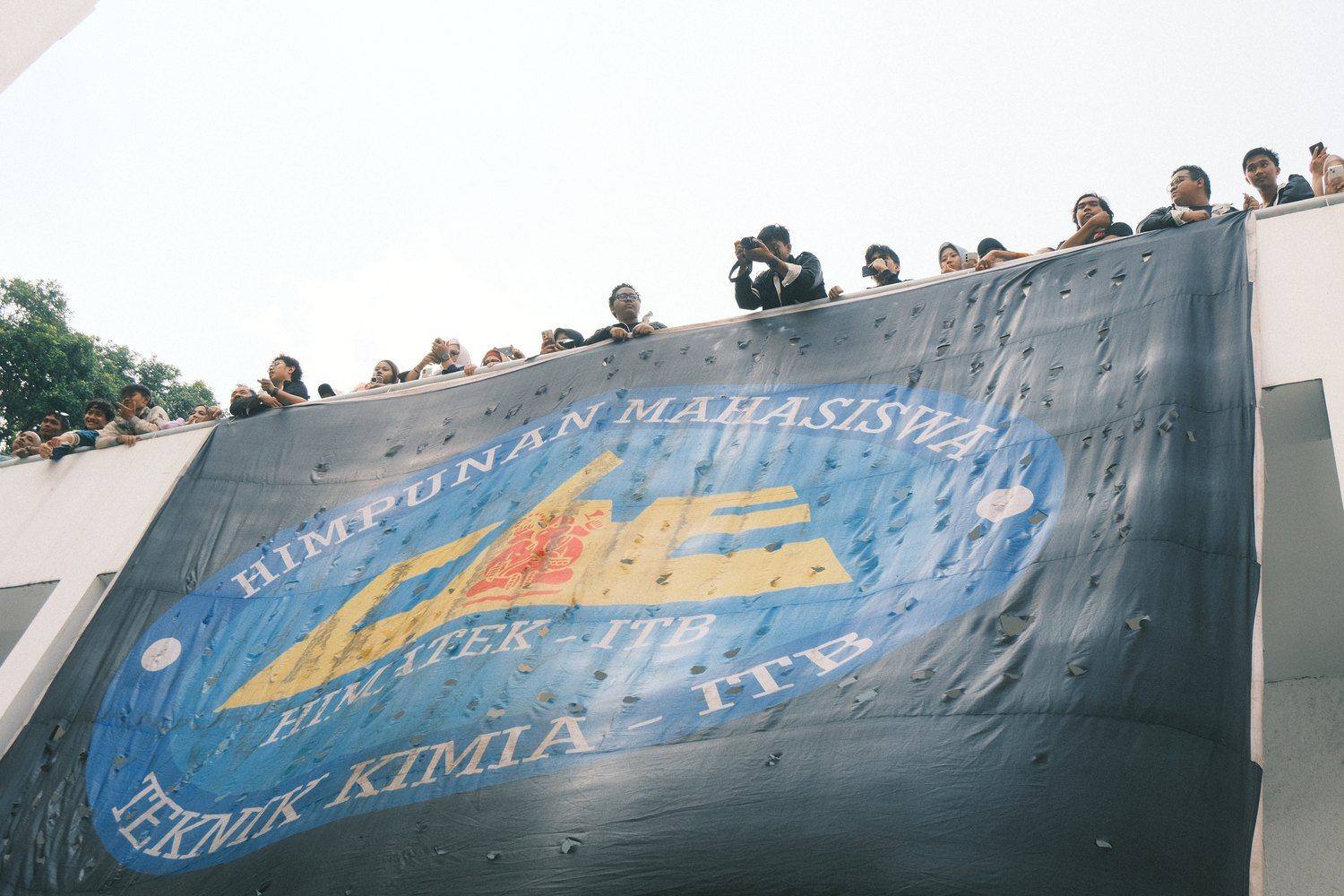 The large HIMATEK-ITB association banner raised by members